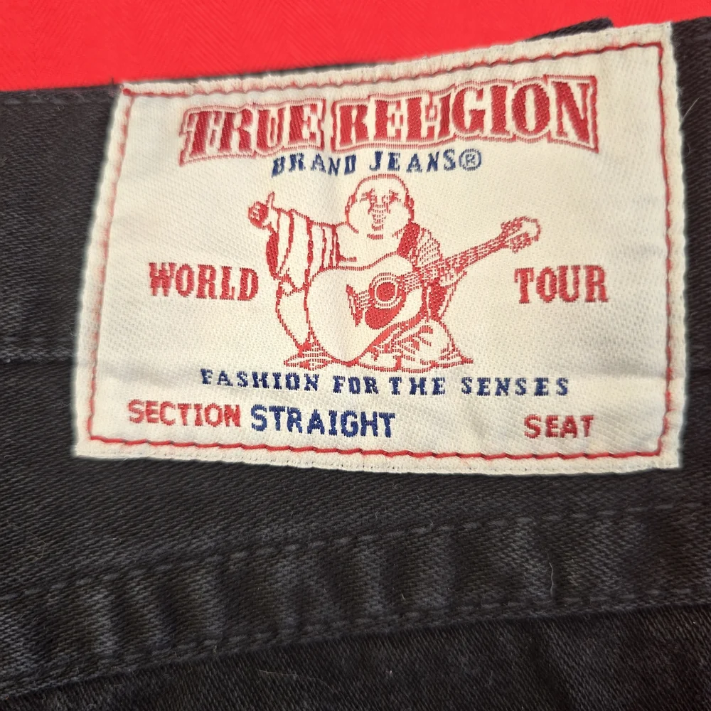 True Religion Black Jeans with Signature Pocket Stitching